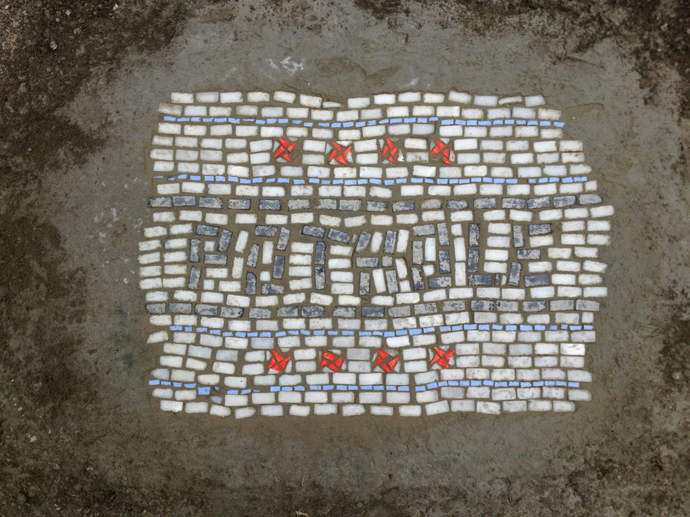 Chicago Artist Mends Potholes with Mosaics potholes mosaics Chicago